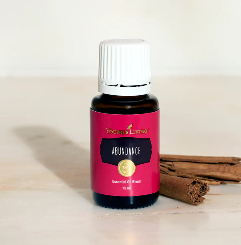 4 bottles of essential oils on a counter